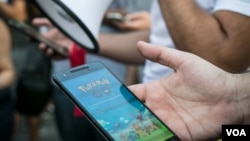 Fans of the game struggled to log on during the Pokemon GO gathering - the game's servers have repeatedly struggled due to overwhelming demand and repeated Denial of Service attacks by hacker group PoodleCorp over the weekend, July 20, 2016.