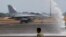 One of two newly acquired FA-50PH fighter jets is given a water cannon salute while taxiing on the runway at Clark Air Base, Philippines, Nov. 28, 2015. 