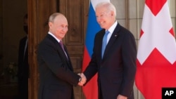 President Joe Biden, right, and Russian President Vladimir Putin meet at the Villa la Grange, in Geneva, Switzerland, June 16, 2021.