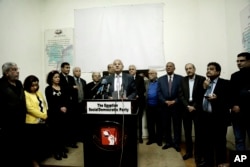 FILE - Magdi Abdel-Hamid, spokesman of the Civil Democratic Movement, speaks during a press conference held by several political parties decrying proposed constitutional amendments, in Cairo, Egypt, Wednesday, March 27, 2019.