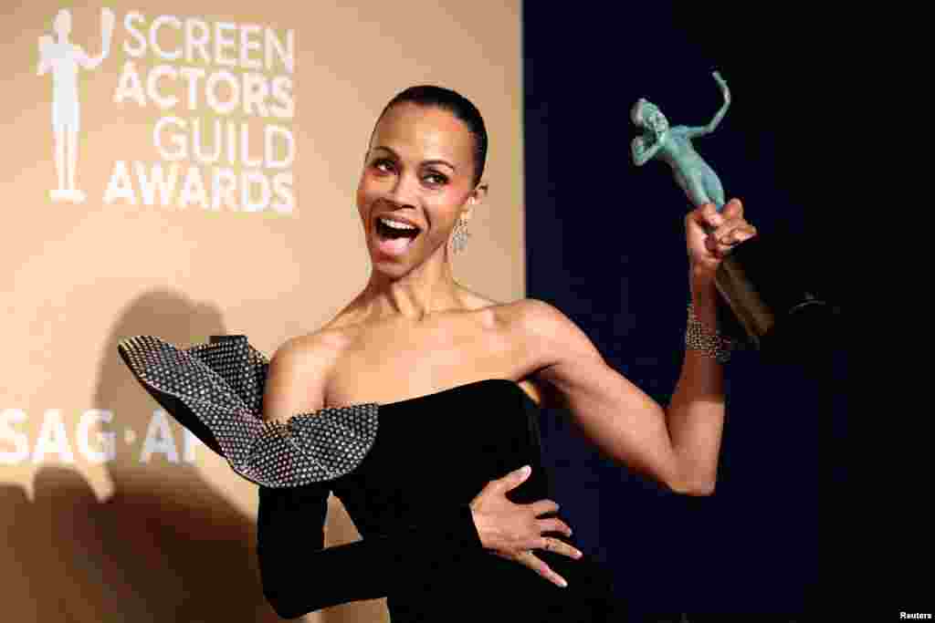 Zoe Saldana poses with the award for Best Performance by a Female Actor in a Supporting Role for &quot;Emilia Perez&quot; at the 31st Screen Actors Guild Awards, in Los Angeles, California, Feb. 23, 2025.