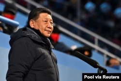 FILE - Chinese President Xi Jinping attends the opening ceremony of the 2022 Beijing Olympics, at National Stadium, in Beijing, China, Feb. 4, 2022.