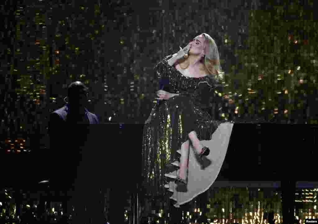 Adele performs at the Brit Awards at the O2 Arena in London, Feb. 8, 2022.&nbsp;Chart-topping superstar Adele won the top three prizes at the&nbsp;BRIT&nbsp;Awards, in the first genderless edition of&nbsp;Britain&#39;s annual pop music honors.