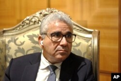 FILE - Libya’s interior minister Fathi Bashagha is interviewed, Jan. 6, 2021 in Tripoli.