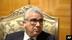 FILE - Libya’s interior minister Fathi Bashagha is interviewed, Jan. 6, 2021 in Tripoli.