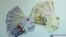 O'zbekistonda yaqinda muomalaga chiqqan 50 ming va 100 ming so'mlik banknotalar 