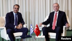 FILE - Turkish President Tayyip Erdogan meets with Greek Prime Minister Kyriakos Mitsotakis at United Nations Headquarters, in New York, Sept. 24, 2024. (Murat Cetinmuhurdar/Turkish Presidential Press Office/Handout via Reuters)