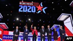 Former Mayor Mike Bloomberg, former Mayor Pete Buttigieg, Sen. Elizabeth Warren, Sen. Bernie Sanders, former Vice President Joe Biden, Sen. Amy Klobuchar and billionaire activist Tom Steyer at the Democratic debate, Feb. 25, 2020, in Charleston, S.C.