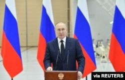 Russian President Vladimir Putin delivers a speech as he visits the Vostochny Cosmodrome in Amur Region, Russia, April 12, 2022. (Sputnik/Evgeny Biyatov/Kremlin via Reuters)