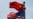 FILE - Chinese and U.S. flags flutter near The Bund, in Shanghai, China July 30, 2019.