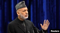 ປ. Hamid Karzai ແຫ່ງອັຟການິສຖານ ກ່າວໄຂກອງປະຊຸມ Loya Jirga, ທີ່ກຸງຄາບູລ.
ວັນທີ 21, 2013. 