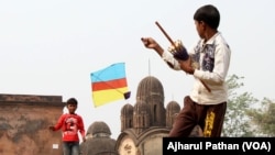 Children flying kites with Chinese manjha.