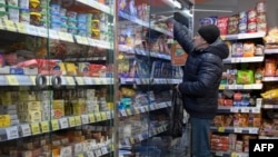 A man shops at a supermarket in Moscow on January 30, 2023.