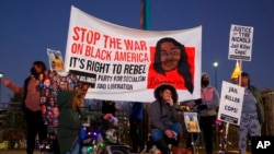 Demonstrators gather during a protest over the death of Tyre Nichols, Jan. 27, 2023, in Atlanta. 