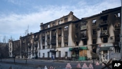 FILE - A city center damaged by Russian shelling in Bakhmut, Donetsk region, Ukraine, Feb. 10, 2023. Russia has been trying to capture the industrial city.