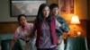 This image released by A24 Films shows, from left, Stephanie Hsu, Michelle Yeoh and Ke Huy Quan in a scene from, "Everything Everywhere All At Once."