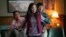 This image released by A24 Films shows, from left, Stephanie Hsu, Michelle Yeoh and Ke Huy Quan in a scene from, "Everything Everywhere All At Once."