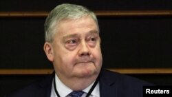 FILE - Belgian lawmaker Marc Tarabella looks on before members of the European Parliament vote on lifting immunity for him and Italian lawmaker Andrea Cozzolino, in Brussels, Belgium, Feb. 2, 2023.