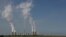 FILE - Smoke billows from the cooling towers of Kriel and Matla Power Stations, coal-fired stations of South African utility Eskom, Jan. 17, 2023.