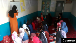 In SRAK’s underground school in Kabul, volunteers teach Afghan girls English, math, sciences and other subjects. (Photo courtesy SRAK)
