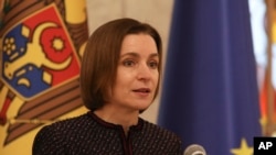 Moldovan President Maia Sandu announces she nominated as Prime Minister designate Dorin Recean to form a new government in Chisinau, Moldova, Feb 10, 2023.