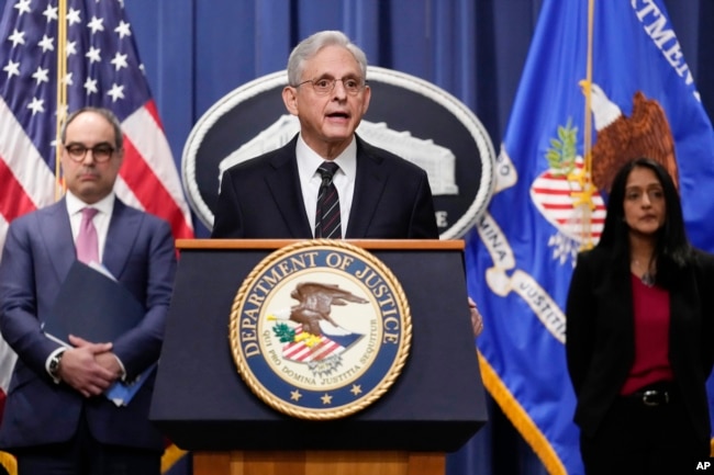 Attorney General Merrick Garland, joined by Associate Attorney General Vanita Gupta and Assistant Attorney General Jonathan Kanter of the Justice Department's Antitrust Division. (AP Photo/Carolyn Kaster)