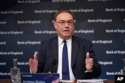 Andrew Bailey, Governor of the Bank of England speaks during the Bank of England Monetary Policy Report press conference at the Bank of England in London, Thursday Feb. 2, 2023. (Yui Mok/Pool via AP)