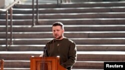 Ukrainian President Volodymyr Zelenskyy addresses parliamentarians during his first visit to the UK since the Russian invasion of Ukraine in Westminster Hall, London, Feb. 8, 2023. (Stefan Rousseau/Pool via Reuters)