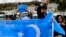 FILE - Members of Uyghur communities take part in a protest against China, near the Chinese consulate in Istanbul, on Dec. 4, 2022.