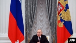 Ruski predsjednik Vladimir Putin predsjedava sastankom savjeta bezbjednosti o afganistanskim pitanjima u Kremlju u Moskvi, 8. februara 2023. godine.