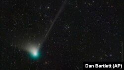 This photo provided by Dan Bartlett shows comet C/2022 E3 (ZTF) on Dec. 19, 2022. It is expected to come within 26 million miles (42 million kilometers) of Earth on Feb. 1, 2023, according to NASA.