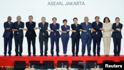 Foreign Ministers of the Association of Southeast Asian Nations pose for group photos during the 32nd ASEAN Coordinating Council meeting at the ASEAN Secretariat in Jakarta, Indonesia, February 3, 2023. 