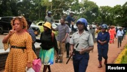 FILE: Opposition party Citizens Coalition for Change supporters arrive at the magistrate court for a bail hearing after they were arrested for unlawful gathering with intent to incite public violence in Harare, Zimbabwe, January 16, 2023