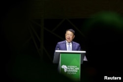 FILE - Zijin Mining chairman and founder Jinghe Chen speaks during the Investing in African Mining Indaba 2023 conference in Cape Town, South Africa, Feb. 6, 2023.