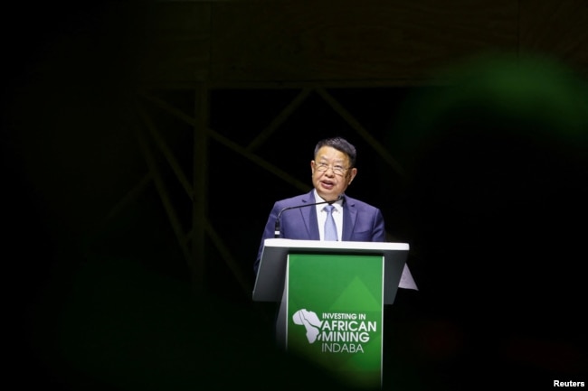 FILE - Zijin Mining chairman and founder Jinghe Chen speaks during the Investing in African Mining Indaba 2023 conference in Cape Town, South Africa, Feb. 6, 2023.