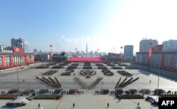 This photo taken on February 8, 2018 and released on February 9, 2018 by North Korea's official Korean Central News Agency (KCNA) shows the military parade to mark the 70th anniversary of the Korean People's Army at Kim Il Sung Square in Pyongyang.