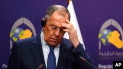 Russian Foreign Minister Sergey Lavrov holds a press conference with his Iraqi counterpart Fouad Hussein at the Ministry of Foreign Affairs in Baghdad, Iraq, Feb. 6, 2023.