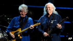 FILE - David Crosby, right, and Graham Nash perform at the 25th Anniversary Rock and Roll Hall of Fame concert at Madison Square Garden, Oct. 29, 2009, in New York.