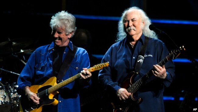 FILE - David Crosby, right, and Graham Nash perform at the 25th Anniversary Rock and Roll Hall of Fame concert at Madison Square Garden, Oct. 29, 2009, in New York.