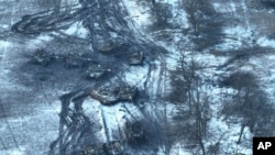 In this image taken in Feb. 2023 and provided Ukraine's Armed Forces, shows damaged Russian tanks in a field after a failed attack, near Vuhledar, Ukraine.