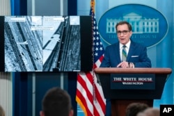 National Security Council spokesman John Kirby says that declassified satellite images displayed during a White House press briefing back up U.S. claims that North Korea delivered arms to Russia for use in its ongoing war in Ukraine, Friday, Jan. 20, 2023, in Washington.