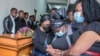 Florence Nyirenda, center, pays her respects during a memorial service for her son Lemekani Nyirenda, during his funeral at Lusaka Baptist Church, in Lusaka, Zambia, Jan. 24, 2023. 