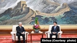 2月10日，中共中央政治局常委王滬寧在北京會見中國國民黨副主席夏立言一行。(新華社照片）