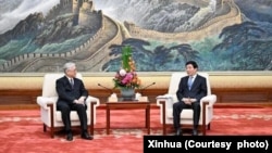 2月10日，中共中央政治局常委王沪宁在北京会见中国国民党副主席夏立言一行。 (新华社照片）