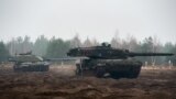 Танки Challenger 2 і Leopard 2 під час навчань у Польщі, Фото: Twitter Міноборони Великої Британії