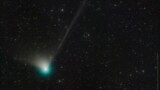 This photo provided by Dan Bartlett shows comet C/2022 E3 (ZTF) on Dec. 19, 2022. It last visited during Neanderthal times, according to NASA. (Dan Bartlett via AP)