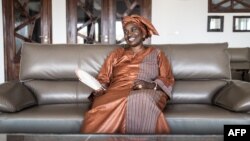 FILE - Aminata Toure, former prime minister of Senegal poses for a portrait in her house in Dakar, Sept. 8, 2022. 