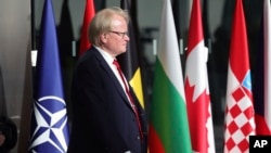 FILE - Swedish Defense Minister Peter Hultqvist arrives for a meeting of NATO defense ministers at NATO headquarters in Brussels, Oct. 12, 2022. 