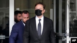 Elon Musk leaves a federal courthouse in San Francisco, Feb. 3, 2023.