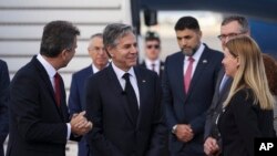 US Secretary of State Antony Blinken, second left, disembarks from the aeroplane to arrive at Israel's Ben Gurion Airport near Tel Aviv, Jan. 30, 2023.